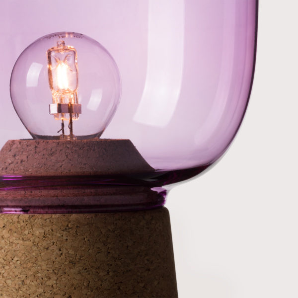 Picia table lamp designed by Enrico Zanolla in purple glass and natural cork, transparent cable, detail of the junction between cork and glass, beautiful match of curves